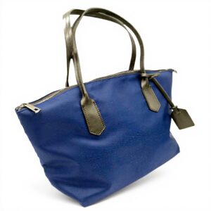 Sac Carolina Pretty Nana cuir nylon bleu porté main femme