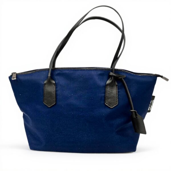 Sac Carolina Pretty Nana cuir nylon bleu porté main femme